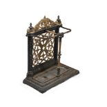 A LATE VICTORIAN CAST IRON AND PARCEL GILT STICK STAND, LATE 19TH CENTURY