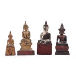 FOUR THAI GILT-WOOD SEATED FIGURES OF BUDDHA