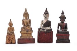 FOUR THAI GILT-WOOD SEATED FIGURES OF BUDDHA