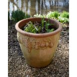 A MODERN TERRACOTTA GARDEN PLANTER