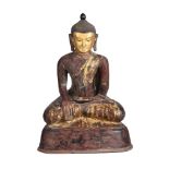 A LARGE BURMESE SEATED LACQUER BUDDHA20TH CENTURYwith red painted and gilt detailsapproximately 8