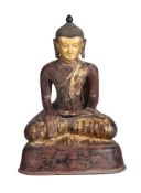 A LARGE BURMESE SEATED LACQUER BUDDHA20TH CENTURYwith red painted and gilt detailsapproximately 8