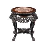 A CHINESE HARDWOOD AND VARIEGATED MARBLE INSET JARDINIERE STAND