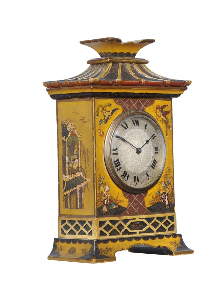 A MANTEL TIMEPIECE WITH YELLOW LACQUERED CASE IN CHONOISERIE STYLE