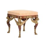 A MAHOGANY AND GILT METAL MOUNTED FOOT STOOL IN EMPIRE STYLE