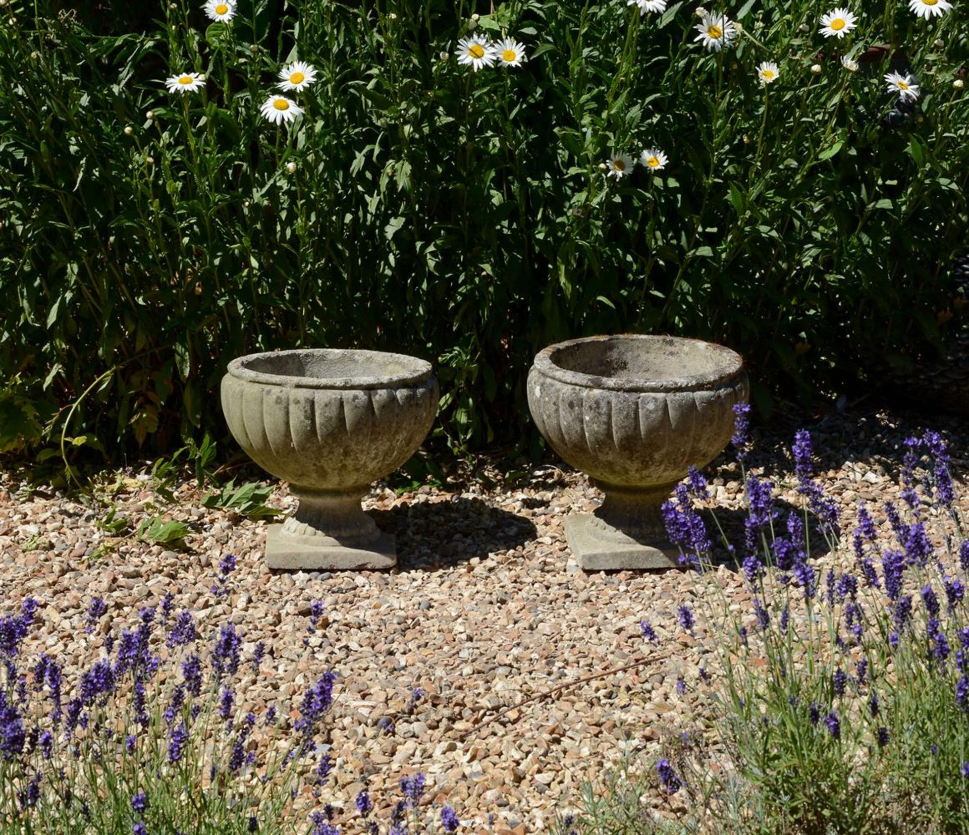 A PAIR OF STONE COMPOSITION GARDEN URNS - Image 2 of 2