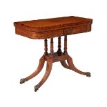 A REGENCY MAHOGANY AND CALAMANDER BANDED CARD TABLE