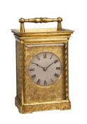 A VICTORIAN ENGRAVED GILT BRASS REPEATING CARRIAGE CLOCK