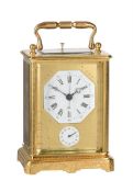 A SWISS ENGRAVED GILT BRASS CENTRE-SECONDS REPEATING ALARM CARRIAGE CLOCK