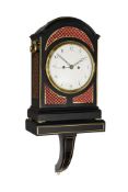 A GEORGE III BRASS MOUNTED EBONISED BRACKET CLOCK WITH FIRED ENAMEL DIAL AND TRIP-HOUR REPEAT