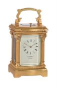 A FINE SWISS GILT BRASS MINUTE-REPEATING MINIATURE CARRIAGE TIMEPIECE