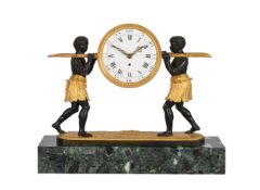 A FRENCH DIRECTOIRE STYLE ORMOLU AND PATINATED BRONZE FIGURAL ‘AU BON SAUVAGE’ MANTEL TIMEPIECE