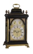 A FINE GEORGE III BRASS MOUNTED EBONISED QUARTER-CHIMING TABLE CLOCK