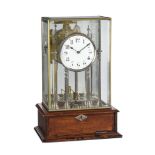 AN ENGLISH NICKEL-PLATED BRASS AND MAHOGANY ELECTRIC TABLE TIMEPIECE
