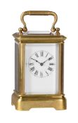 A FRENCH BRASS MINIATURE CARRIAGE TIMEPIECE