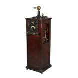 A RARE WOODEN-CASED ELECTROTHERAPY OR DIATHERMY MACHINE