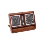 A SWISS LEATHER-CASED TRAVELLING ALARM TIMEPIECE COMPENDIUM WITH BAROMETER AND THERMOMETER