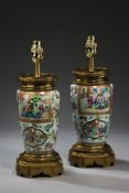 A PAIR OF CANTON EXPORT FAMILLE VERT PORCELAIN VASES, LATE 19TH CENTURY AND LATER FITTED AS LAMPS