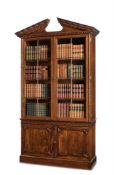 A GEORGE II MAHOGANY BOOKCASE, IN THE MANNER OF THOMAS CHIPPENDALE