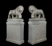 A LARGE PAIR OF CARVED STONE 'MEDICI LIONS', IN THE 'GRAND TOUR' MANNER, 20TH CENTURY