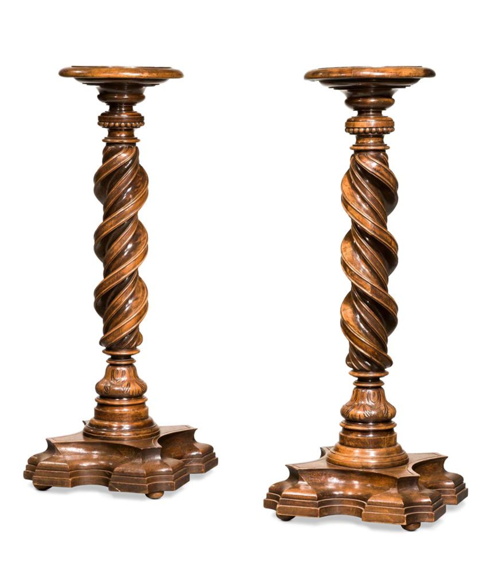 A PAIR OF ITALIAN CARVED WALNUT TORCHERES, IN 17TH CENTURY STYLE, 19TH CENTURY