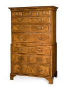 A GEORGE III WALNUT AND FRUIT WOOD CROSSBANDED CHEST ON CHEST, CIRCA 1780