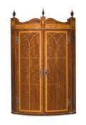 Y A MAHOGANY AND SATINWOOD BANDED BOW FRONT HANGING CORNER CABINET, LATE 19TH CENTURY