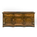 A GEORGE III OAK DRESSER BASE, SECOND HALF 18TH CENTURY