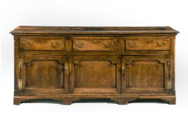 A GEORGE III OAK DRESSER BASE, SECOND HALF 18TH CENTURY