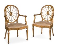 A PAIR OF CARVED BEECH OPEN ARMCHAIRS, IN THE MANNER OF GEORGE HEPPLEWHITE, 19TH CENTURY