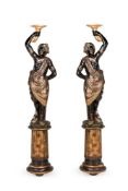 A PAIR OF CARVED AND POLYCHROME DECORATED 'BLACKAMOOR' FIGURES, 19TH CENTURY
