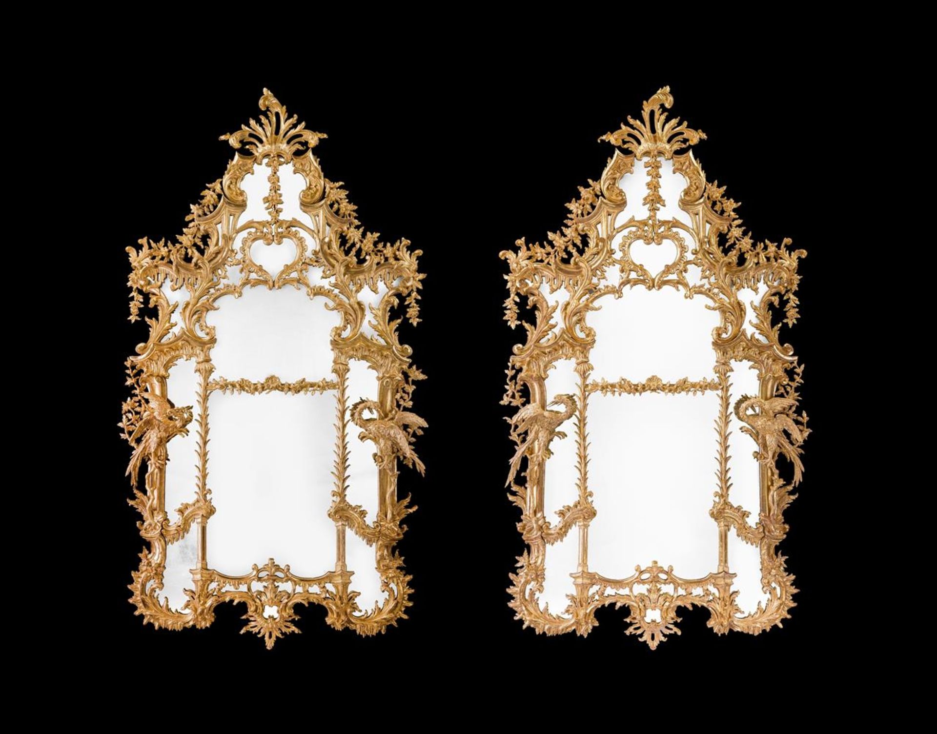 A PAIR OF MONUMENTAL CARVED GILTWOOD PIER MIRRORS, LATE 18TH OR 19TH CENTURY