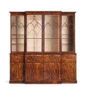 A GEORGE III MAHOGANY BREAKFRONT SECRETAIRE BOOKCASE, CIRCA 1800