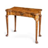 A GEORGE I WALNUT AND FEATHER BANDED CARD TABLE, CIRCA 1720