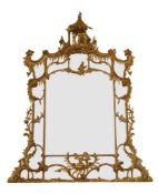 A LARGE CARVED GILTWOOD OVERMANTLE MIRROR, IN GEORGE III STYLE, LATE 18TH/19TH CENTURY