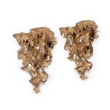 A PAIR OF CARVED GILTWOOD WALL BRACKETS, IN GEORGE III STYLE