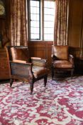 A PAIR OF MAHOGANY LIBRARY BERGERE ARMCHAIRS, IN REGENCY STYLE, 20TH CENTURY