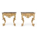 A PAIR OF ITALIAN CARVED GILTWOOD CONSOLE TABLES, MID 18TH CENTURY