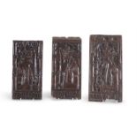THREE CARVED OAK PANELS DEPICTING KINGS OF ANTIQUITY, 16TH/17TH CENTURY