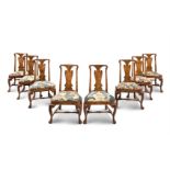 A SET OF EIGHT GEORGE II WALNUT CHAIRS, CIRCA 1730