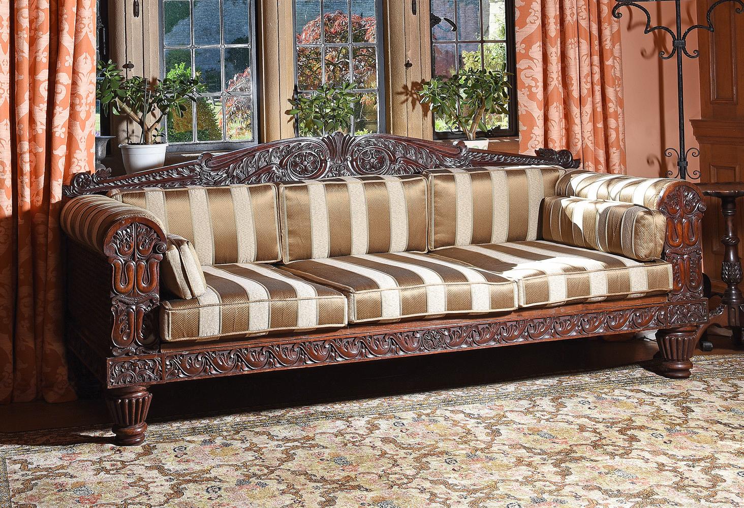 Y A GEORGE IV CARVED ROSEWOOD AND UPHOLSTERED SOFA, POSSIBLY ANGLO-INDIAN, CIRCA 1830