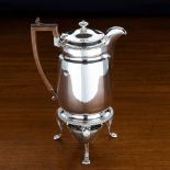 A GEORGE IV SILVER BIGGIN COFFEE POT ON HEATER STAND, ROBERT GARRARD