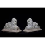 A PAIR OF CARVED MARBLE LIONS, PROBABLY EARLY 19TH CENTURY