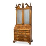 A WALNUT AND PARCEL GILT BUREAU BOOKCASE, MID 18TH CENTURY AND LATER