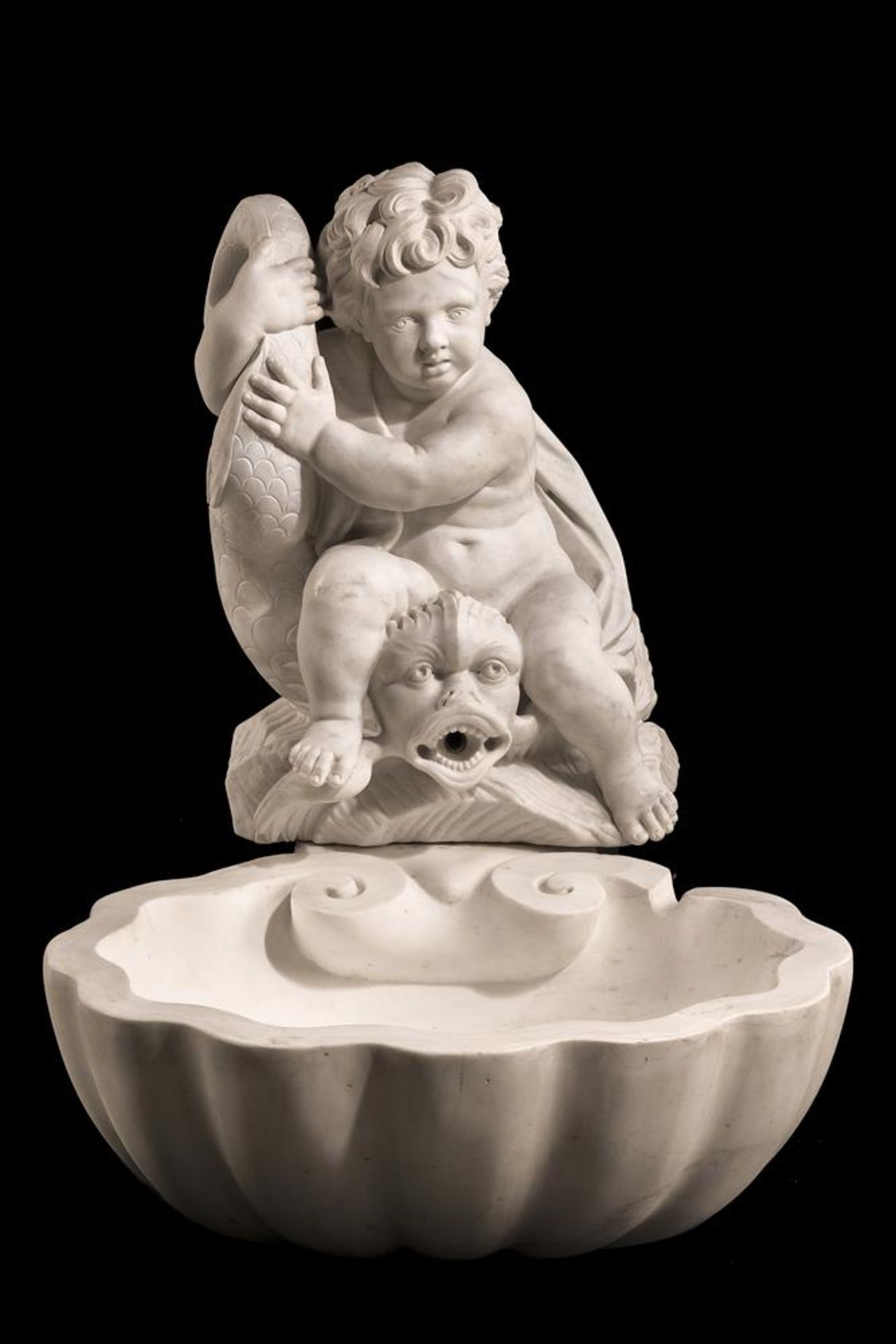 A CARVED CARRARA MARBLE WALL FOUNTAIN, ITALIAN, 19TH CENTURY