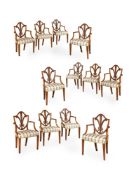 Y A CLOSELY MATCHED SET OF TWELVE SATINWOOD DINING ARMCHAIRS, CIRCA 1800