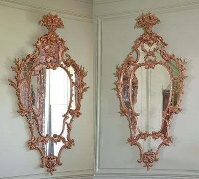 A PAIR OF GEORGE III CARVED GILTWOOD WALL MIRRORS, IN THE MANNER OF JOHN LINNELL, CIRCA 1770