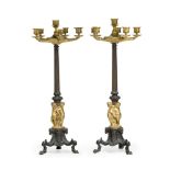 A LARGE PAIR OF PATINATED AND PARCEL GILT SIX LIGHT CANDELABRA, 19TH CENTURY