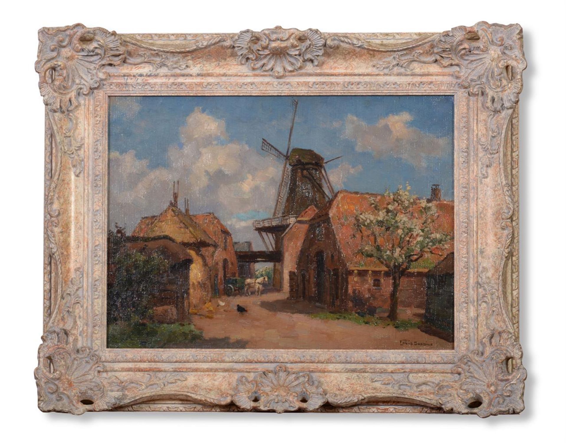 λ LOUIS SOONIUS (DUTCH 1883-1956), A WINDMILL IN A VILLAGE