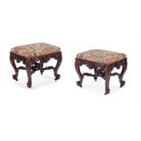 A PAIR OF CARVED MAHOGANY STOOLS IN GEORGE II STYLE, LATE 19TH/ EARLY 20TH CENTURY